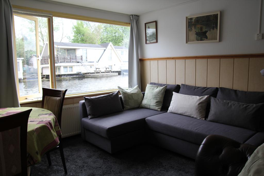 Houseboat Under The Mill Hotel Amsterdam Exterior photo